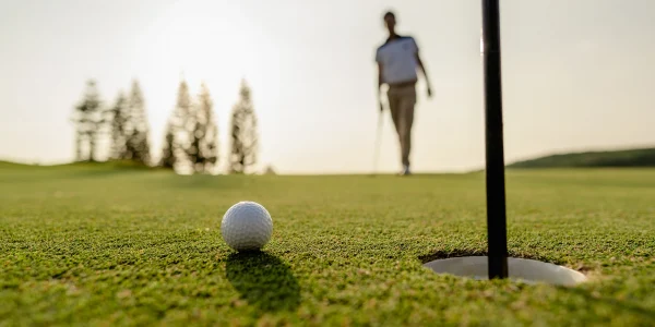 golfer-putting-golf-ball-on-golf-course-he-is-walk-2026-01-07-00-17-37-utc copy